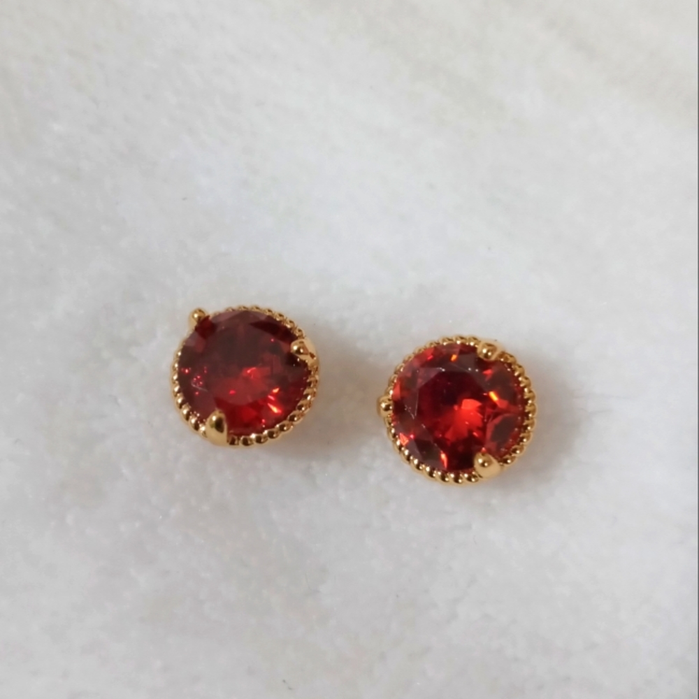 Red gold tone earrings